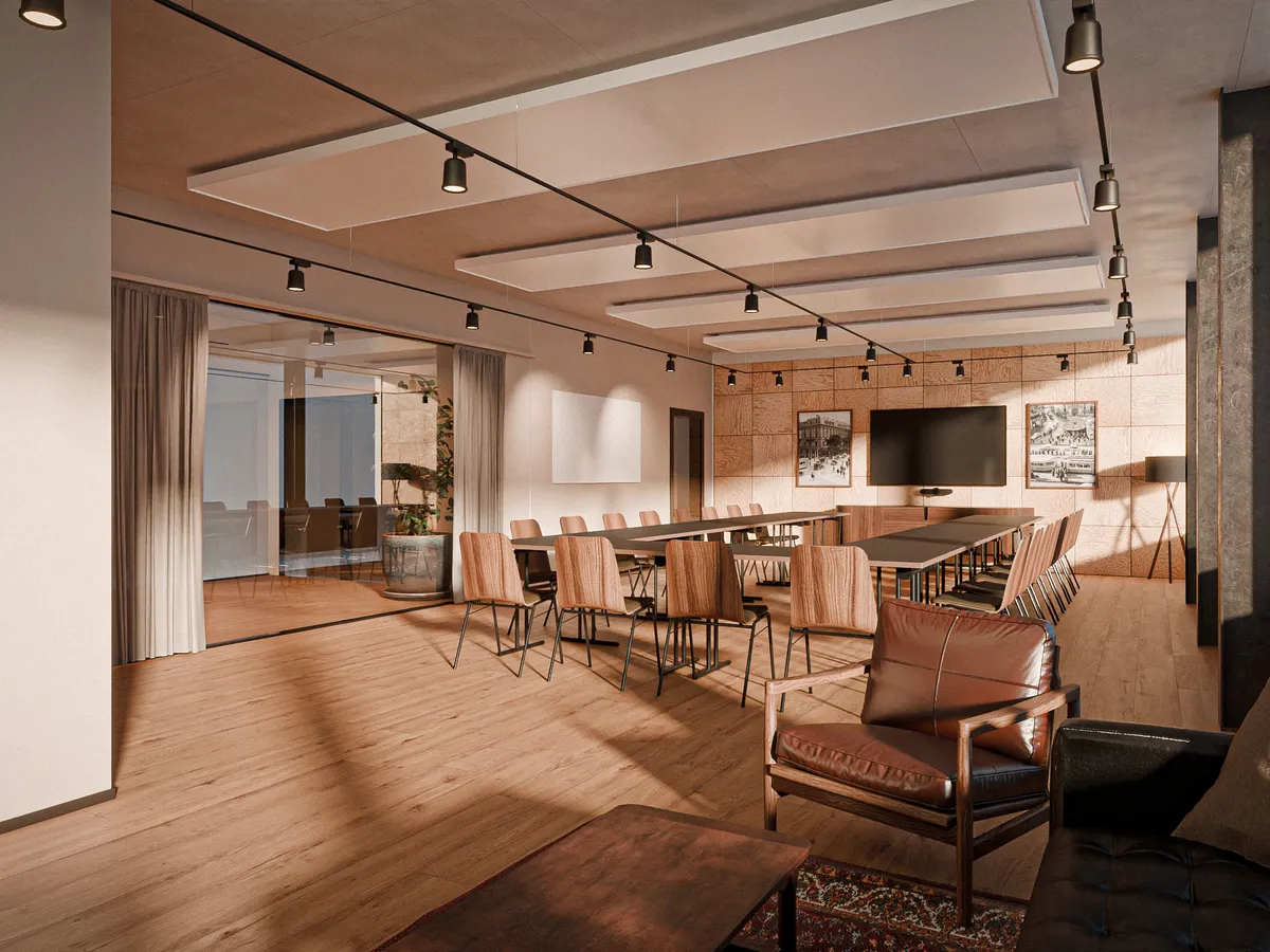 A spacious, modern meeting room with natural light and parquet flooring; a seating area in the foreground